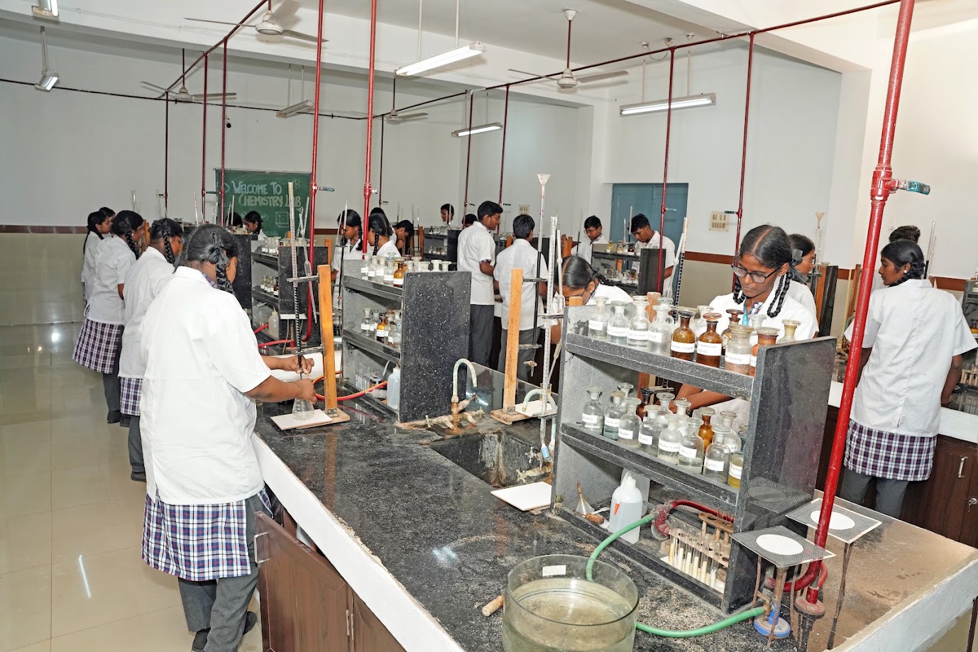 Chemistry laboratory with work stations and fume hoods